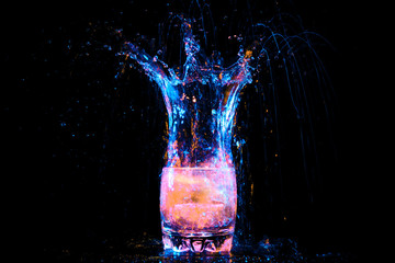 cocktail in glass with splashes