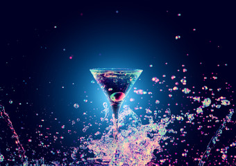 Colourful cocktail in glass with splash