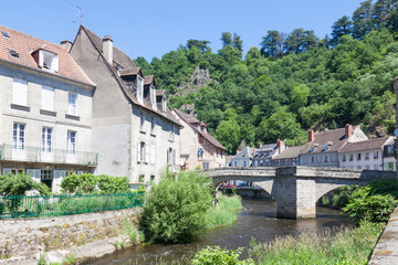 Fototapeta na wymiar Pont de Terrade over the River Creuse, Aubusson, Creuse, Limousin, France leading to the medieval weavers quarters for the 500yr old Unesco French tapestry industry