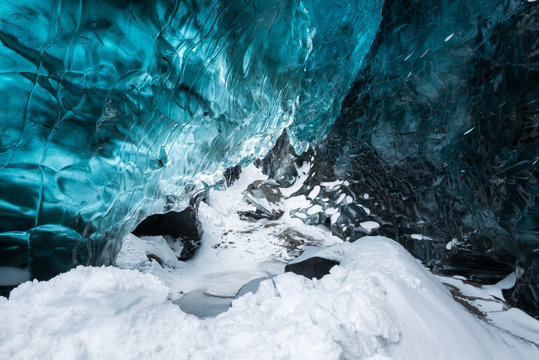 Blue crystal clear ice inside the ice cave, Vatnajokull glacier, Iceland