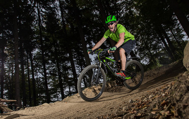 Fototapeta na wymiar Rider in action at Mountain Bike