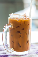 iced tea with milk in glass.