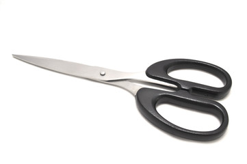 Ножницы на белом фоне крупным планом