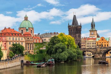 Fototapeta premium PRAGUE, CZECH REPUBLIC. View of the Vltava river , buildings and The Charles Bridge
