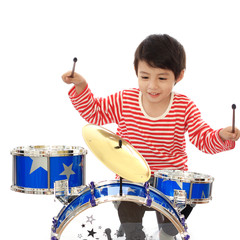 Asian young boy playing blue drum on white background