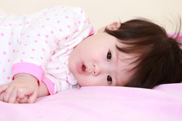 baby girl on the bed