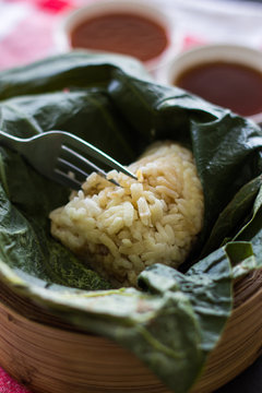 Rice wrapped in lotus leaf. Thai food.