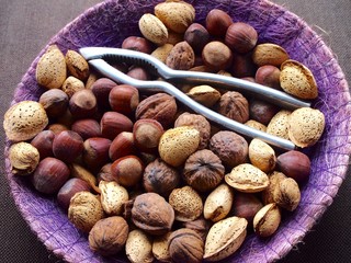 Mix of nuts, almonds and walnuts with nutcracker