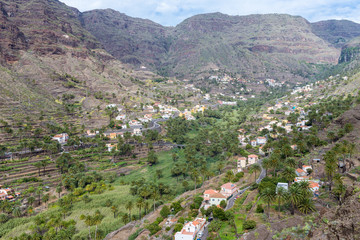 Fototapeta na wymiar The Valle Gran Rey, the beautiful canyon on La Gomera is located on the west side of the island. Gomera has a unique nature that invites to hike. The terraces are still used for agriculture