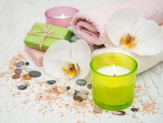 Orchids, candle, towel and handmade soap