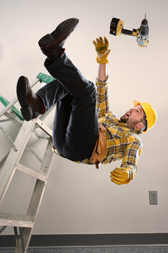 Worker Falling From Ladder