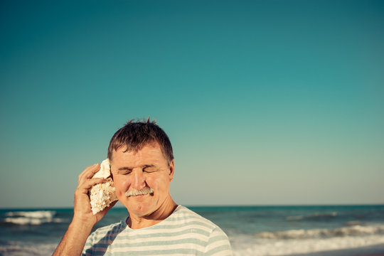 Senior Man On The Beach