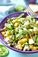 Spinach salad with sweet corn,boiled egg and fried bacon.