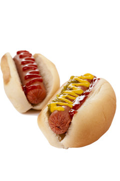 two hotdog  sandwiches