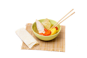 Thailand chicken soup, tom yum kai in bowl on bamboo background