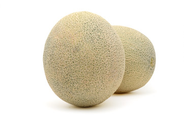 Cantaloupe melon slices isolated on white background