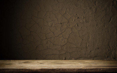 Wooden deck table on green grunge background