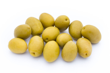 Olives on leaves isolated on white.