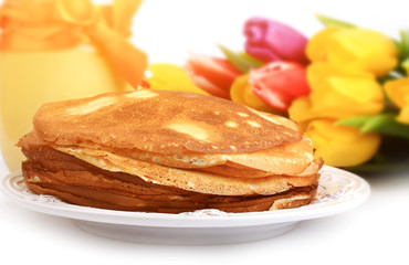 pancakes mango curd tulips on a white background