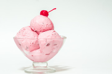 fruit icecream and candied sweet cherries and cherry,isolates,in a cup of ice cream