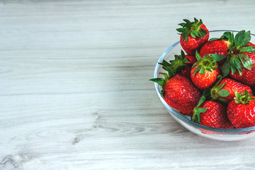 strawberries in a glass dish