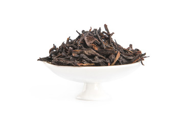 Honey Orchid Phoenix Bird Oolong on white porcelain holder