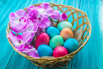 colored eggs on a wooden background