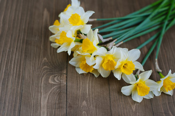 narcissus flowers on a wooden table