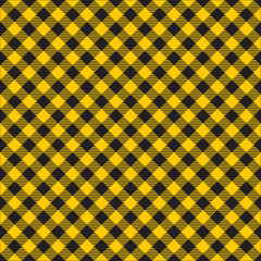 Seamless Yellow and Black Checkered Plaid Fabric Pattern 