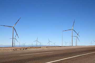 wind turbines at one side of the road