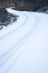 Fototapeta na wymiar The snow road in winter 