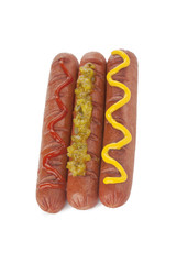 ketchup, mustard and pickles on hotdogs