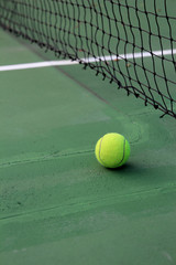 Tennis ball on a tennis court