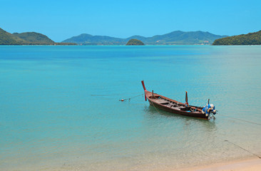 Wooden boat in beach and sea, Phuket Thailand