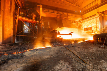 Fototapeta na wymiar Blast furnace smelting liquid steel in steel mills