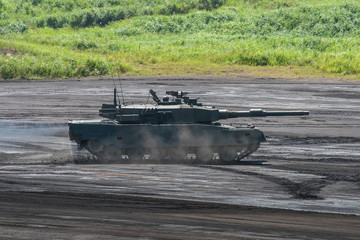 Modern military tank on the move