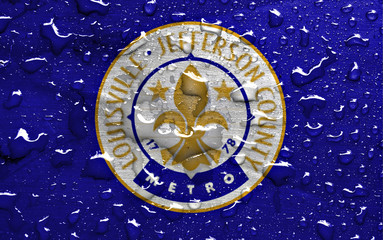 flag of Louisville with rain drops
