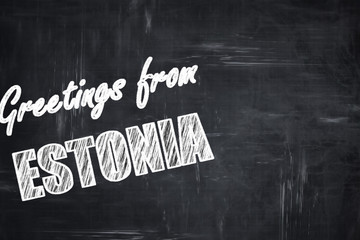 Chalkboard background with chalk letters: Greetings from estonia