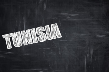 Chalkboard background with chalk letters: Greetings from tunisia