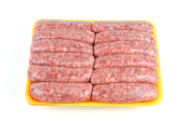 raw sausage in the container on white background