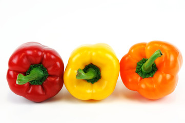 colorful peppers isolated on white background