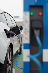 Power supply for electric car charging.  Electric car charging station. Close up of the power...