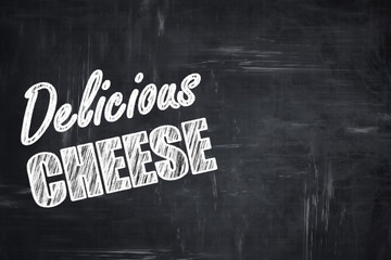 Chalkboard background with chalk letters: Delicious cheese sign