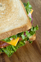 ham sandwich in wooden background