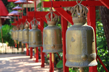 Fototapeta premium antique bells in a buddhist temple of Thailand
