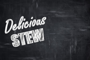 Chalkboard background with chalk letters: Delicious stew sign