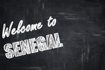 Chalkboard background with chalk letters: Welcome to senegal