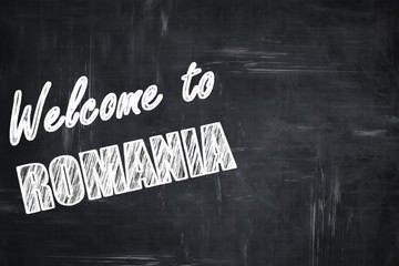 Chalkboard background with chalk letters: greetings from romania