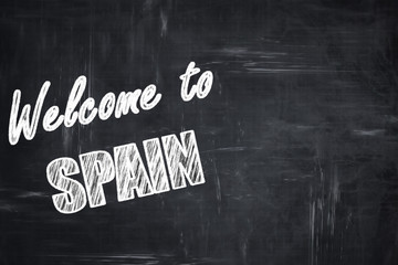 Chalkboard background with chalk letters: Welcome to spain