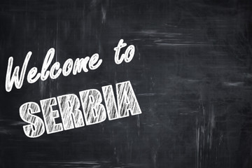 Chalkboard background with chalk letters: Welcome to serbia